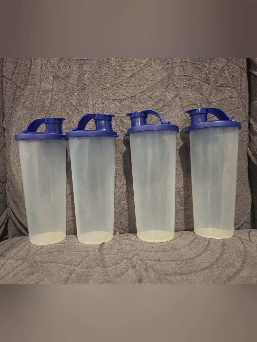 Tupperware Clear Tumbler Bottles with Blue Flip Lids - Set of 4